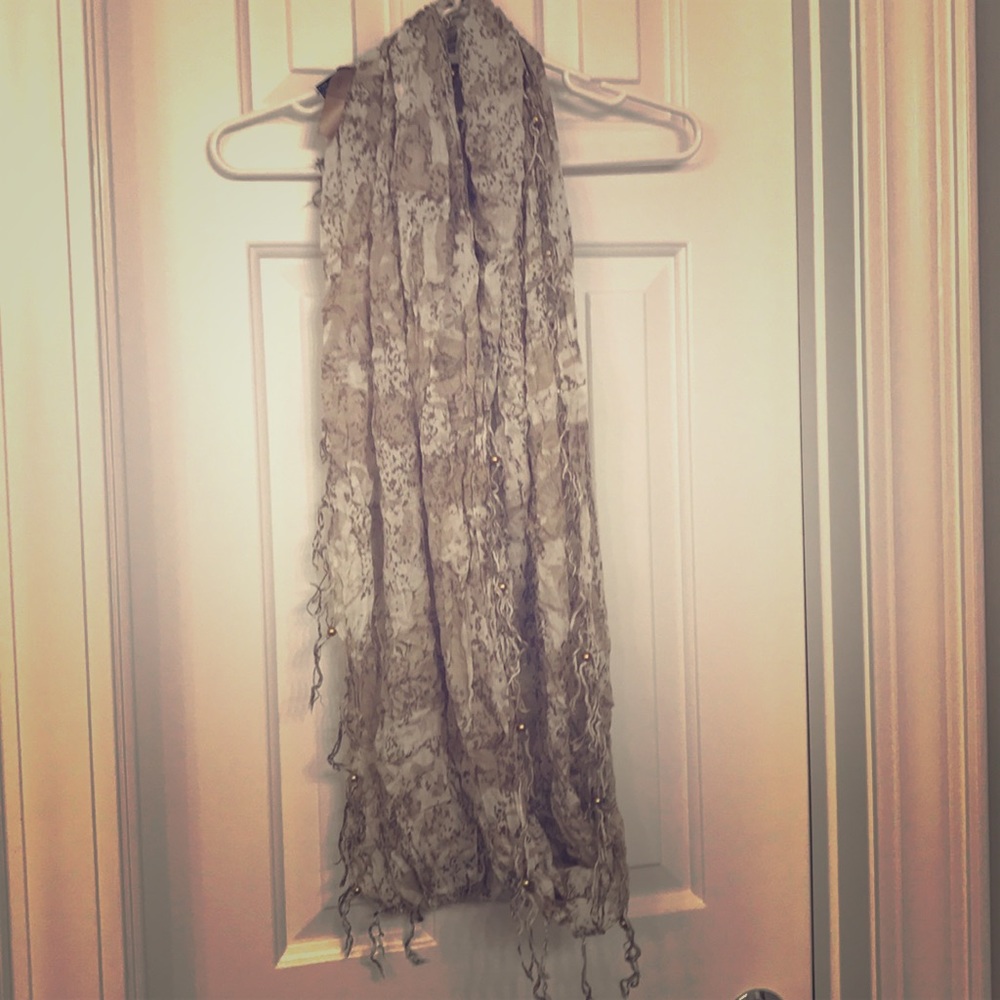 Fringed champagne and ivory infinity scarf